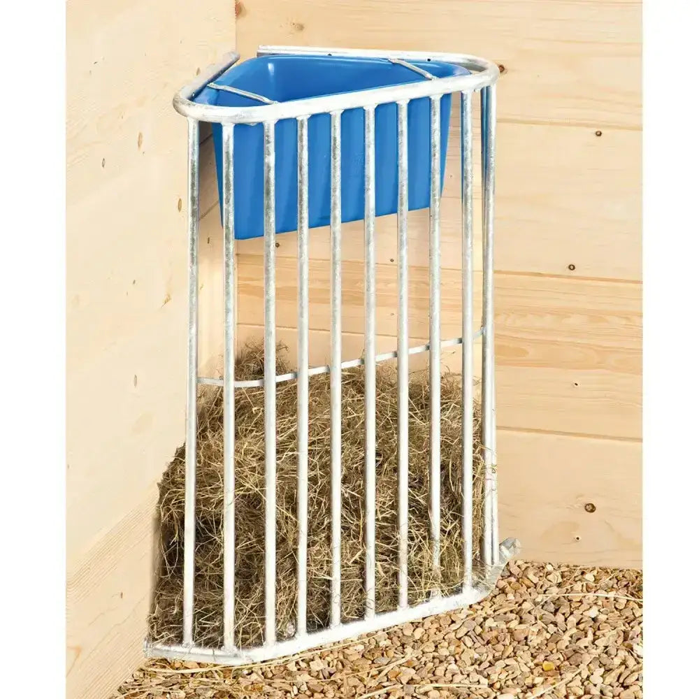 Silver metal corner hay feeder with blue plastic tray for ground level feeding horse’s hay stubbs munch station