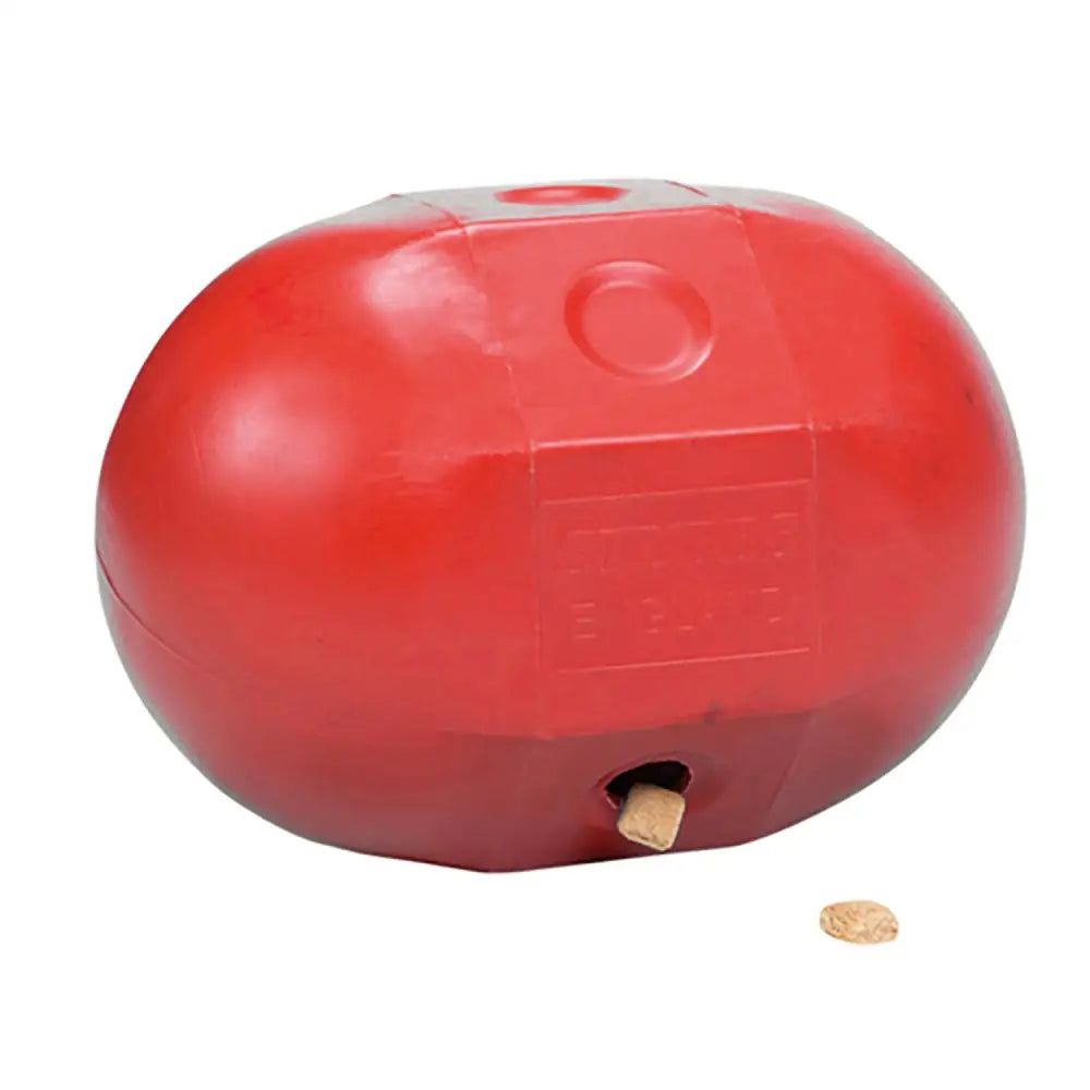 Red plastic stubbs rock n roll ball dog toy with small hole and embossed logo great as a dribble treat feeder