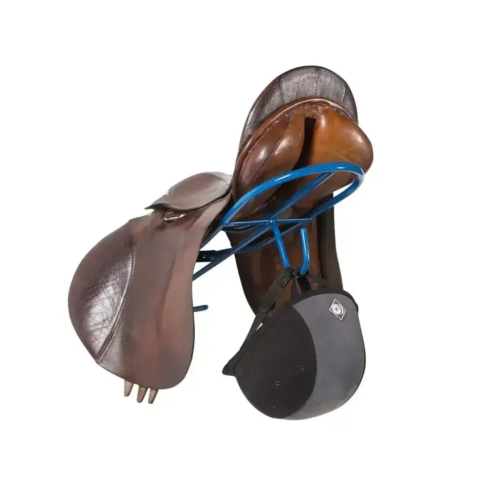 Brown leather english saddle on blue metal stubbs saddle hook s174 with black riding helmet beside it