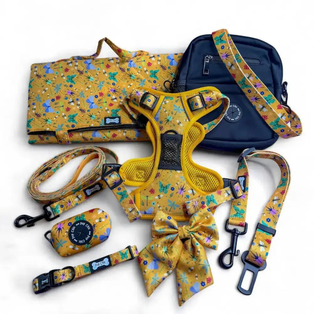 Summer buzzin tactical dog harness with yellow insect print mesh panels black hardware and adjustable step-in design