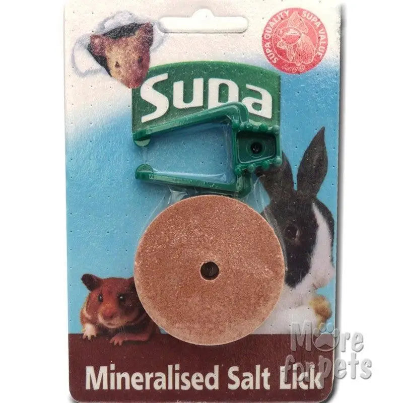 Green plastic clip holding a round brown small animal mineralised salt lick for pets supa small animal mineralised salt lick