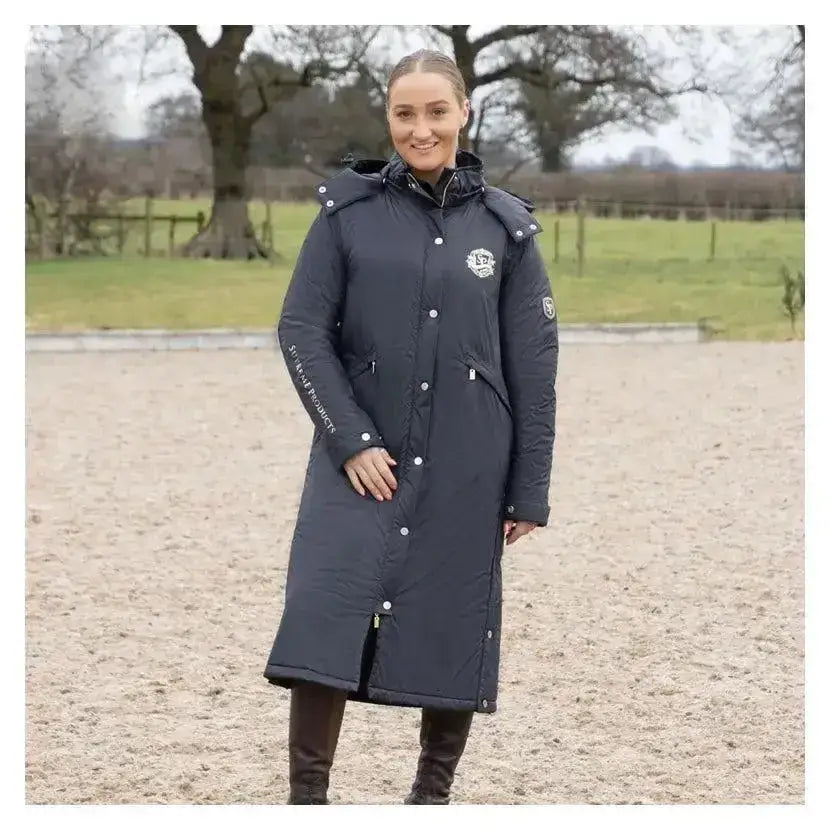 Dark navy quilted supreme products active junior show rider waterproof coat with hood button closure and embroidered logo
