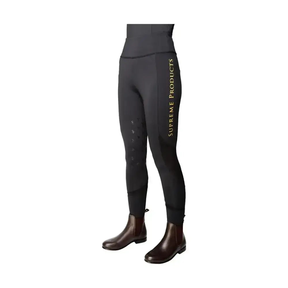 Black supreme products active rider leggings with gold vertical lettering and a flattering fit along the outer thigh