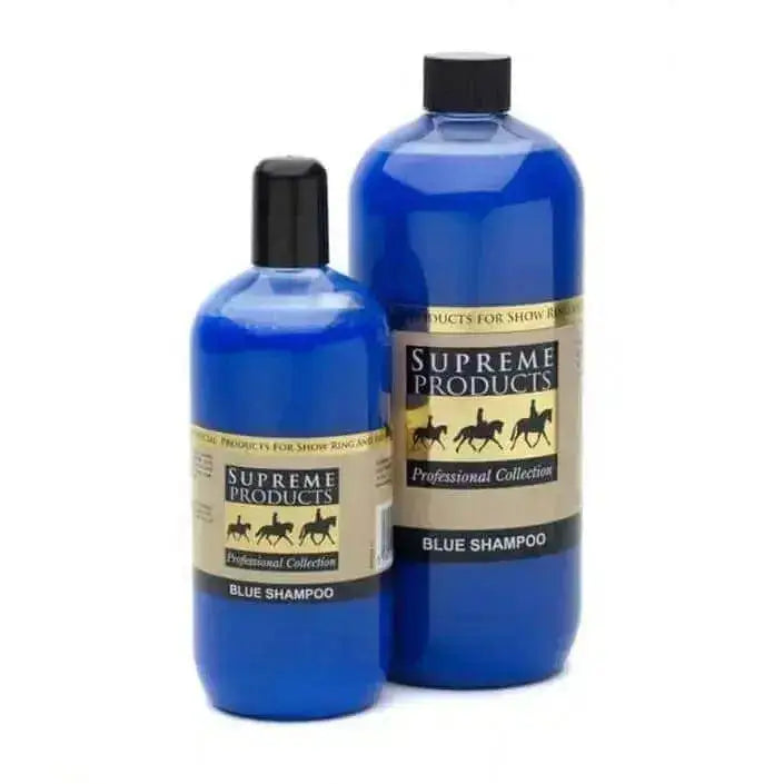 Two blue plastic bottles of supreme products blue shampoo professional with black caps showing blue shampoo works effectively