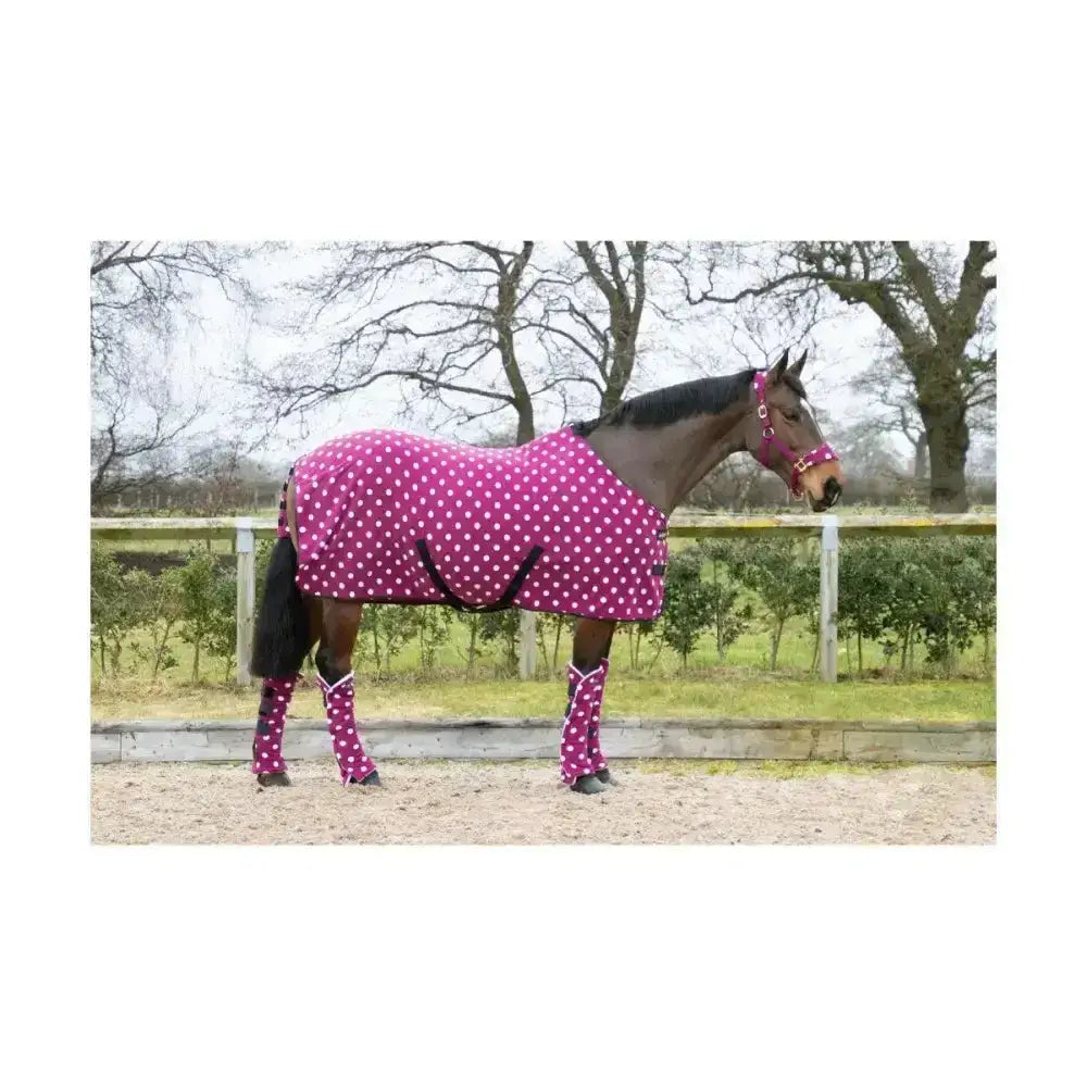 Supreme products dotty fleece rug in vibrant magenta with white polka dots featuring soft fleece leg wraps and headpiece