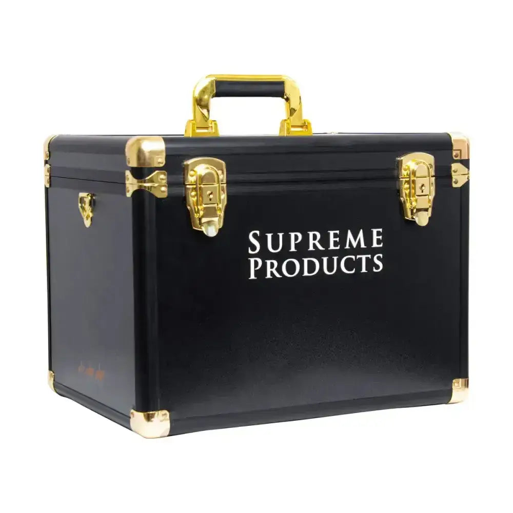 Black supreme products pro groom hardshell box with gold-tone metal latches and handle for secure grooming storage
