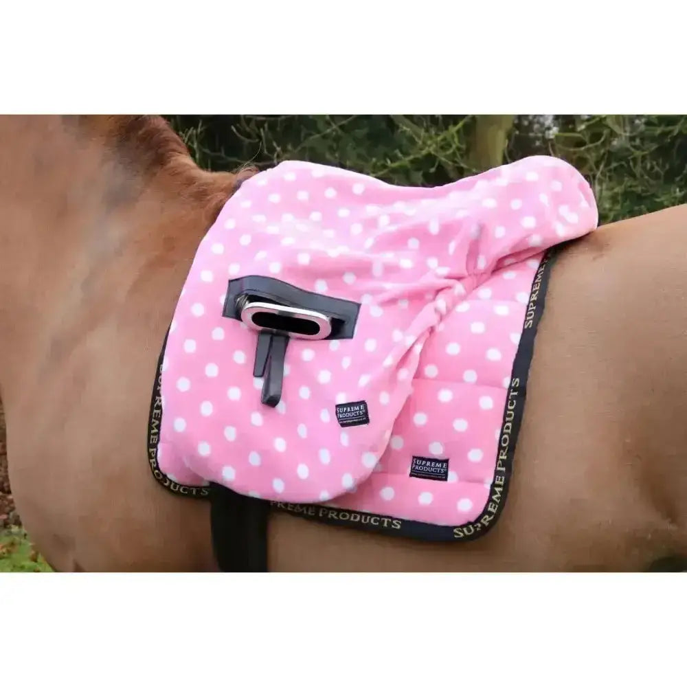 Pink polka dot soft fleece saddle pad with black trim and built in phone holder by supreme products ride on dotty fleece saddle