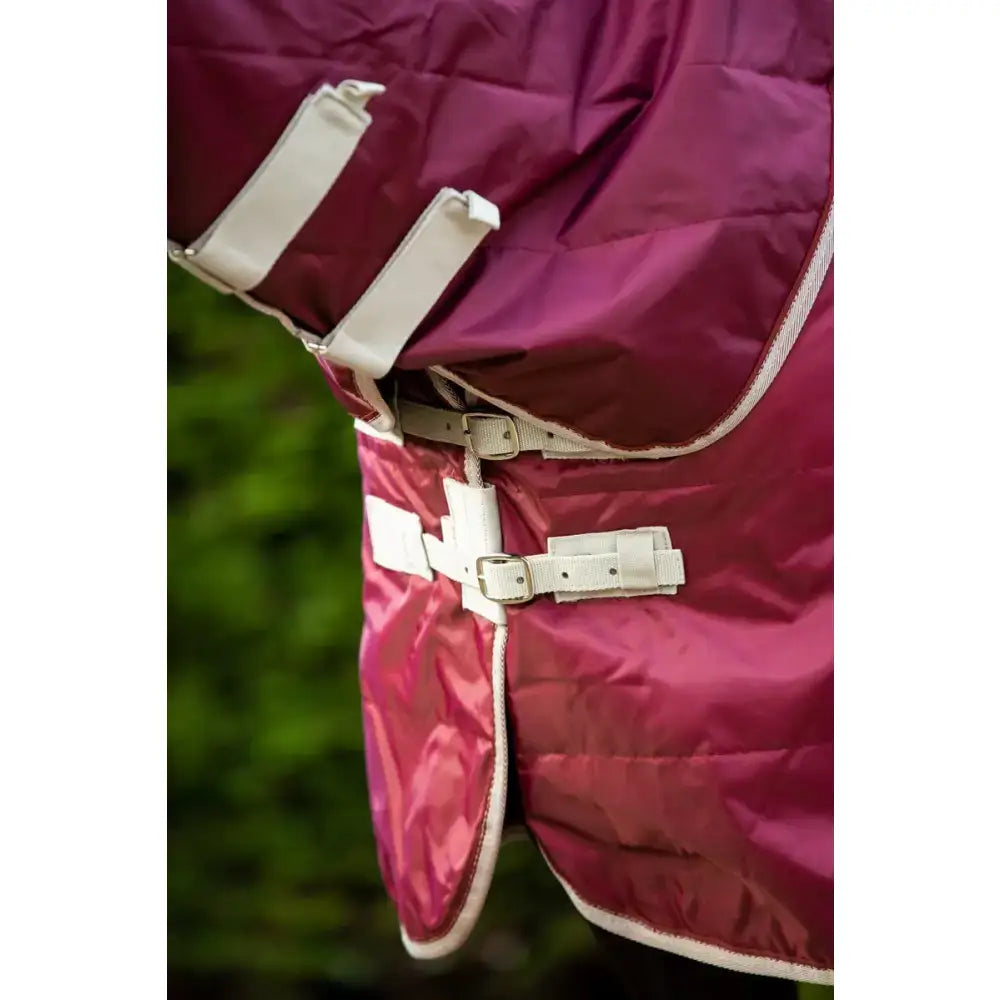 A maroon swish 100g lightweight stable rug with detachable neck burgundy and soft nylon lining straps and buckles