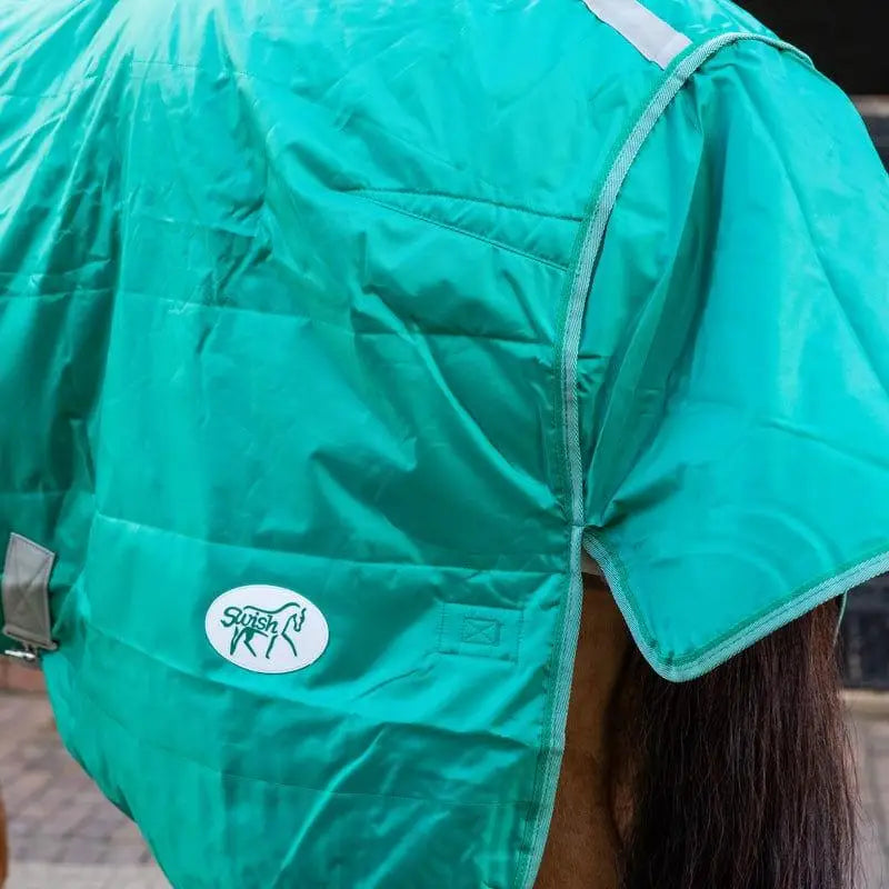 Teal swish 100g lightweight stable rug with detachable neck green and soft nylon lining featuring white oval logo patch