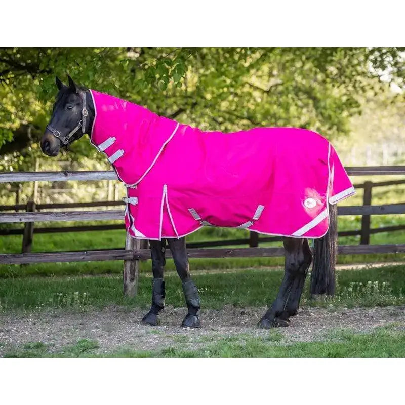Vibrant pink 200g turnout rug with detachable neck cover white trim reflective strips and tail flap for horses