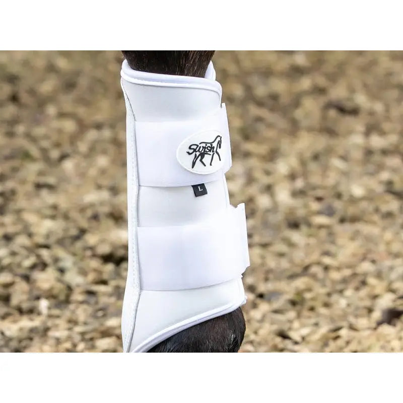 White swish horse boot with double locking straps padded strike pad and breathable neoprene for brushing protection