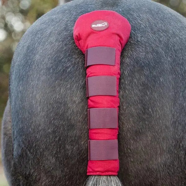 Red padded swish horse tail guard burgundy with dark purple velcro straps and circular brand logo visible on back side