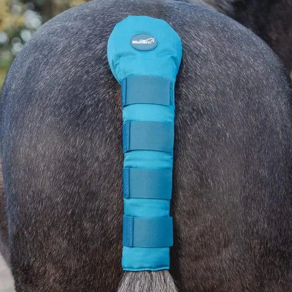 Turquoise swish horse tail guard made of high quality cotton with adjustable straps and branded logo patch