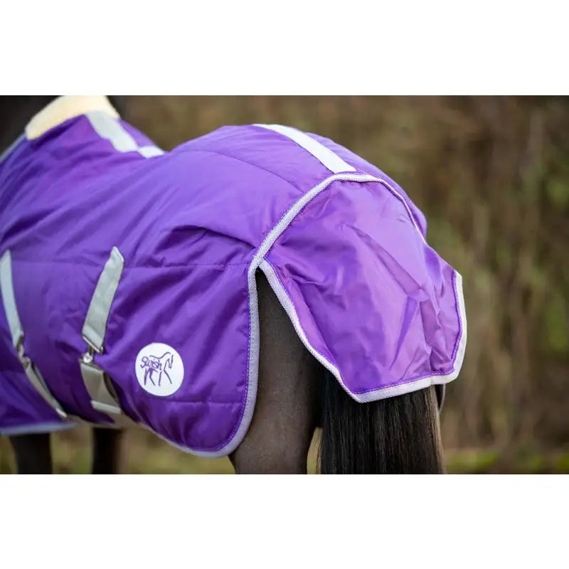 Purple swish mini 100g stable rug with silver reflective strips, cross surcingles, and white horse logo