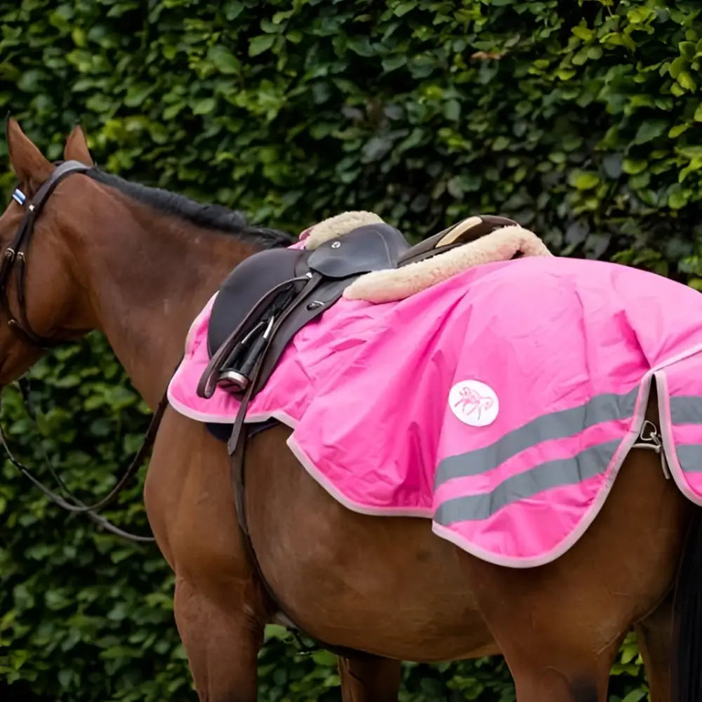 Bright pink waterproof exercise sheet with luxury fleece lining and gray reflective strips featuring white logo