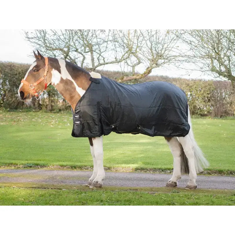 Black quilted swish wide fit 50g horse rug liner with reflective striping and side pockets for extra storage