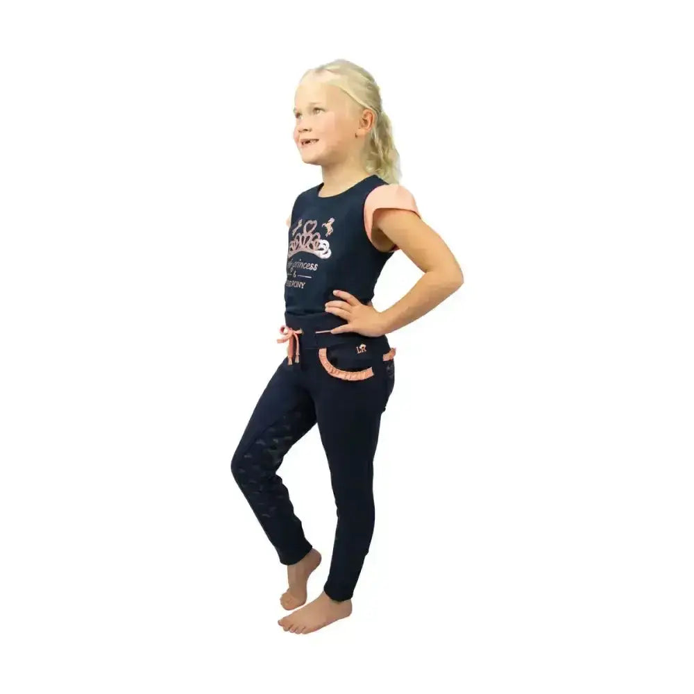 Navy t-shirt features pink accents and a playful graphic perfect for pony loving princesses by little rider