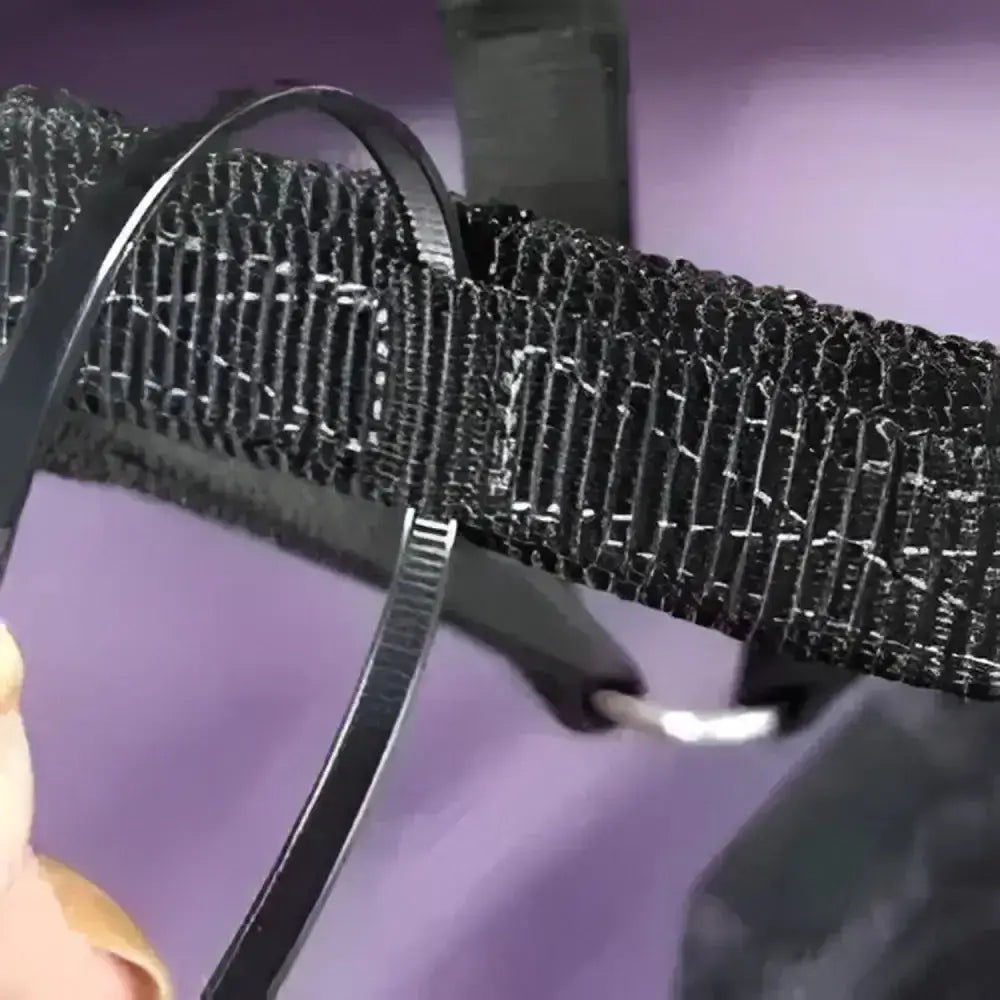 Black mesh strap with sleek textured weave and metallic clasp on thinline flexible breakaway field safe headcollar