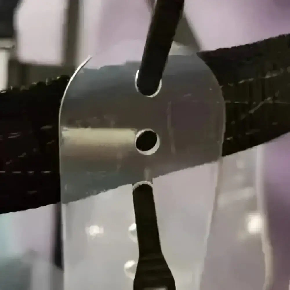 Silver metal blade with two holes attached to black strap on thinline flexible breakaway field safe headcollar