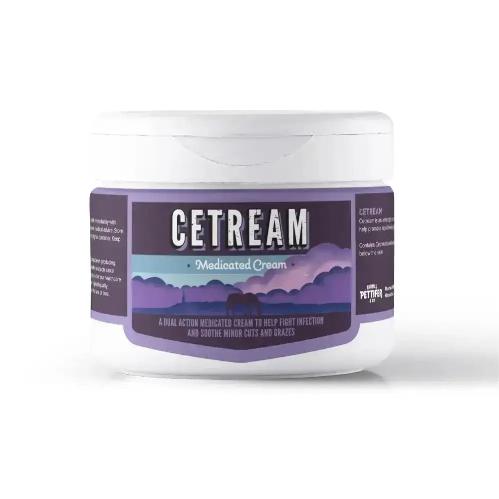 White plastic jar of thomas pettifer cetream cream with purple blue mountain label to soothe damaged skin
