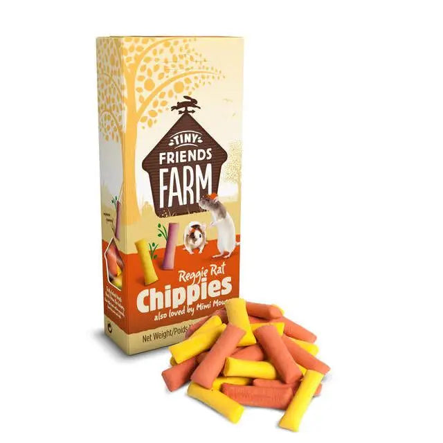 A box of tiny friends farm reggie rat chip 8x120g with orange and yellow chewy treats scattered beside it