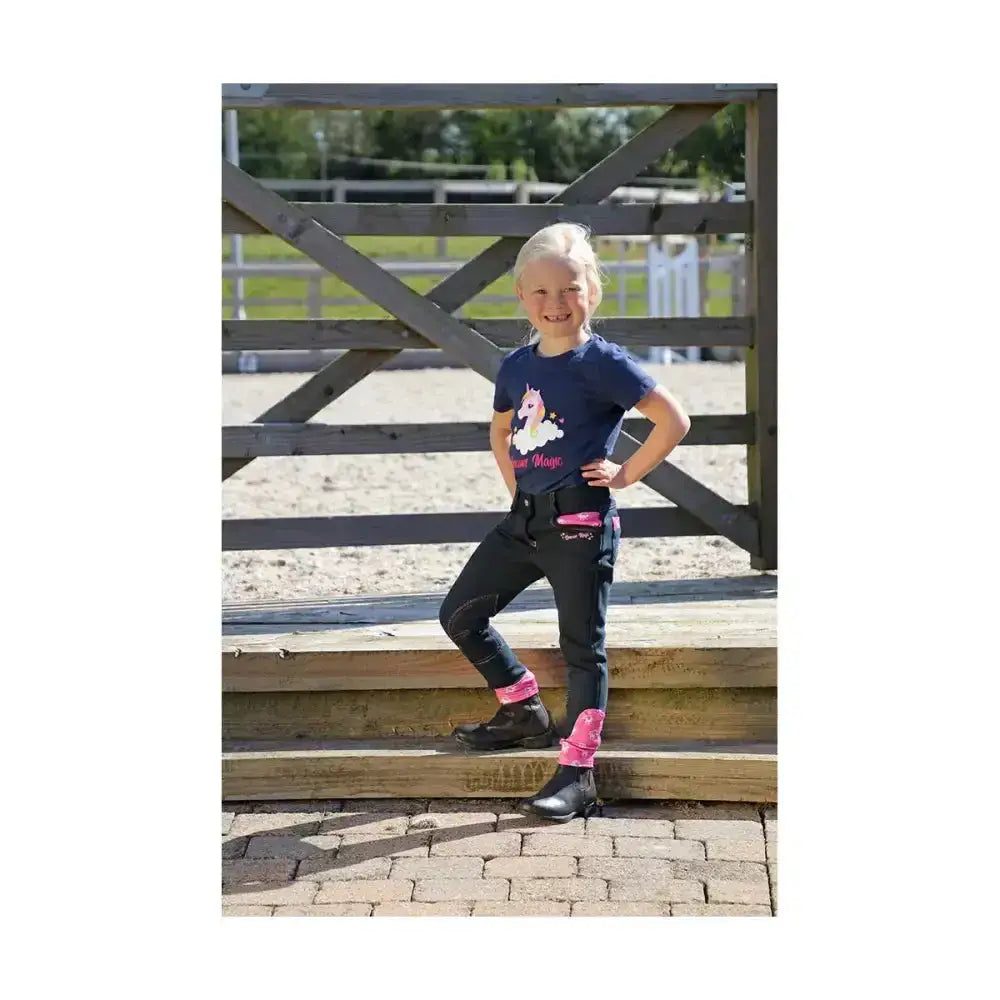 Navy blue unicorn magic breeches t-shirt with pink trim and dream magic text perfect for little rider fans