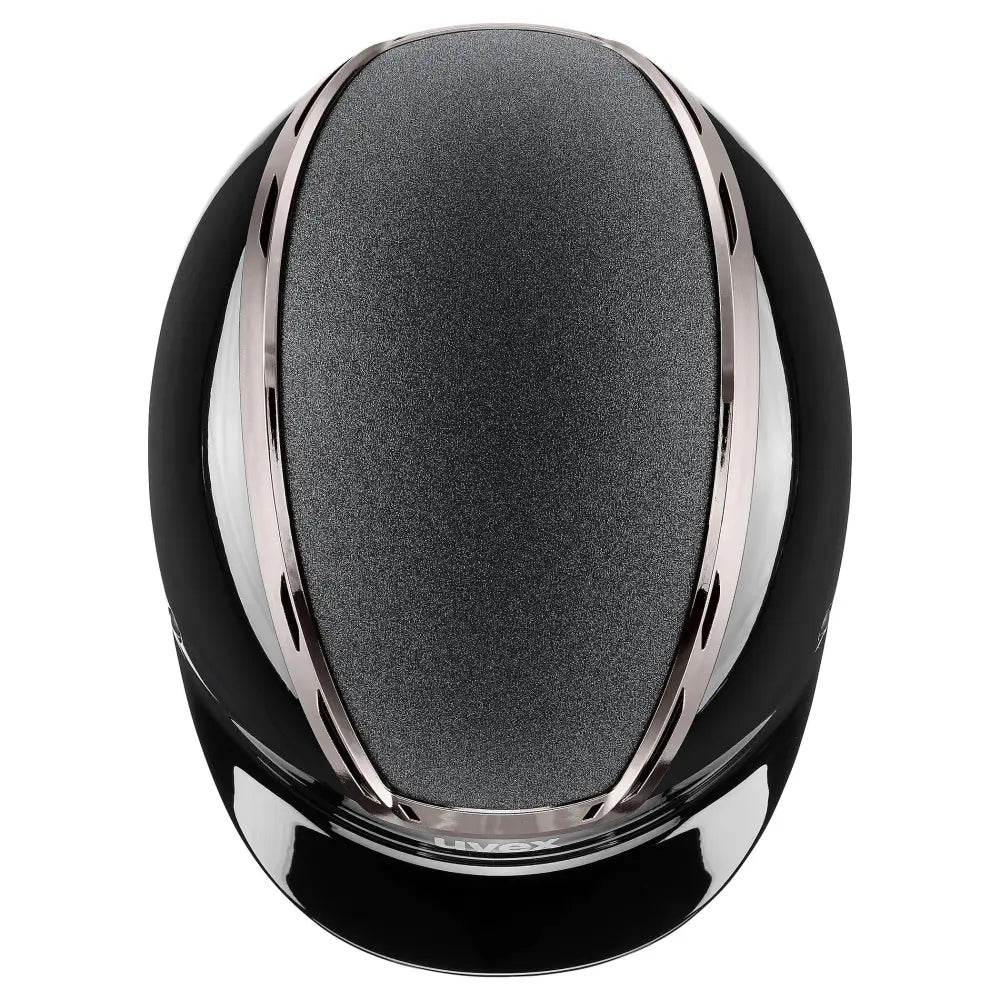 Black and silver uvex exxeed blaze riding hat with textured gray inner lining and extremely impact resistant design
