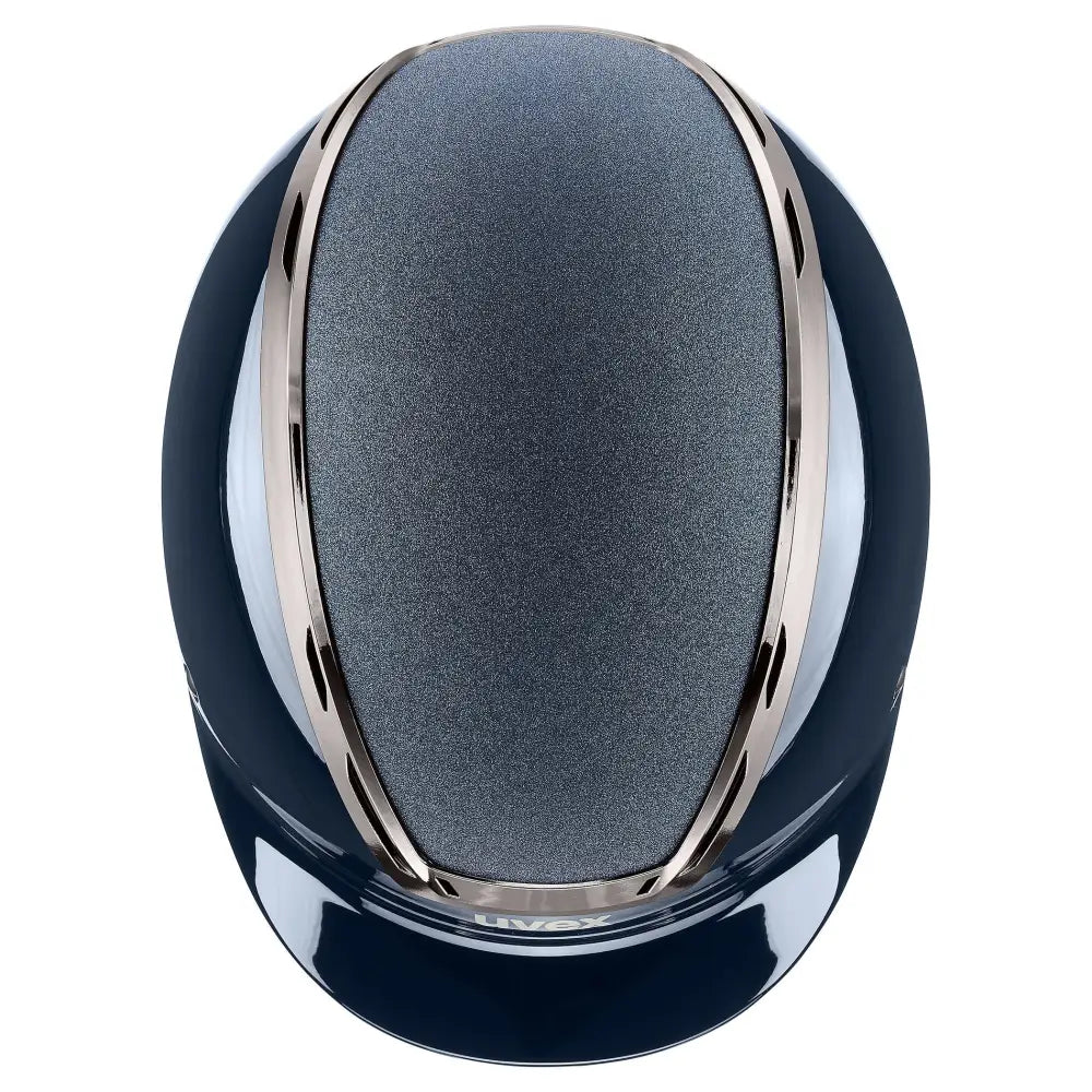 A sleek navy blue uvex exxeed blaze riding hat with textured gray lining and polished metallic trim, extremely impact resistant