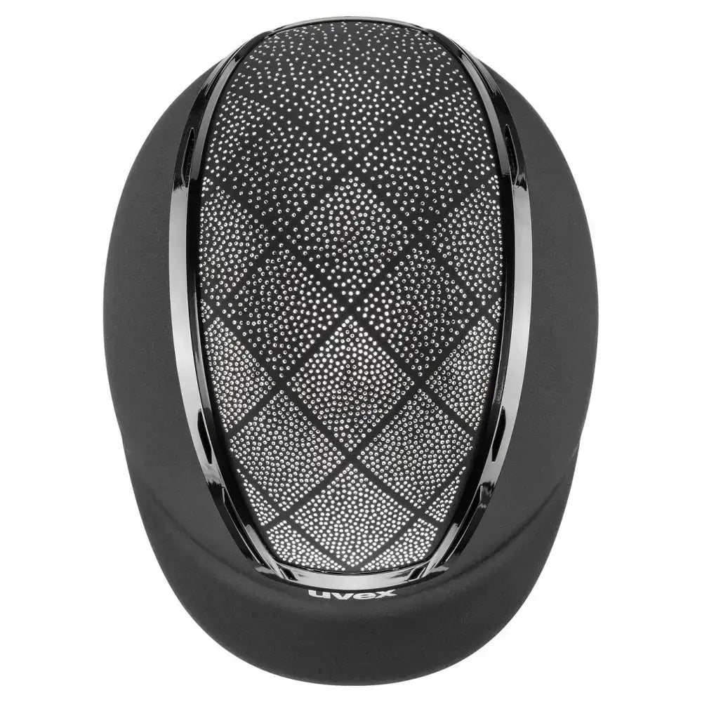 Black uvex exxeed flash riding hat with glossy finish diamond mesh panel and chrome trim vegan leather details