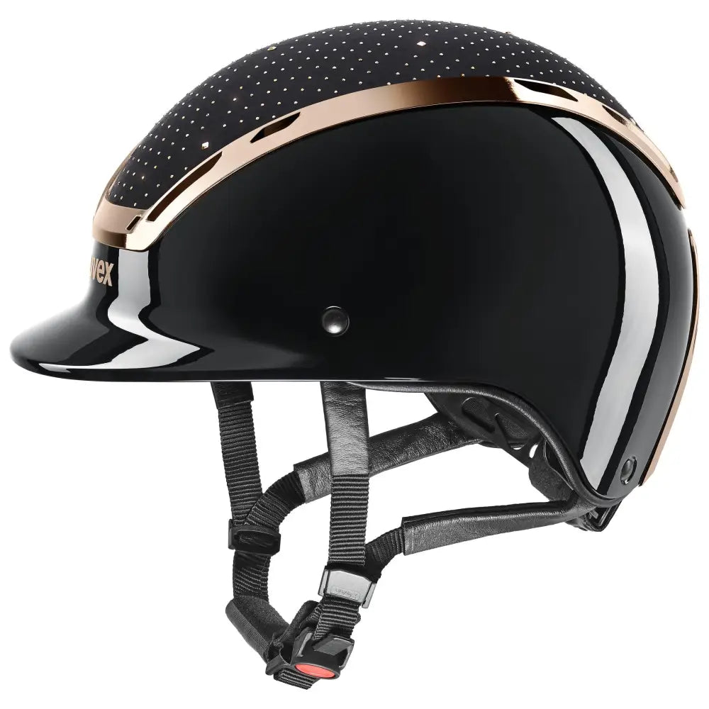 Black glossy uvex exxeed glow riding helmet with rose gold and silver accents and perforated top panel featuring uvex 3d ias