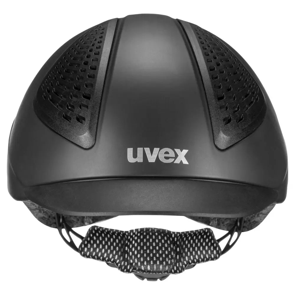 Black uvex exxential iii adjustable riding hat with perforated ventilation and textured chin strap for comfort