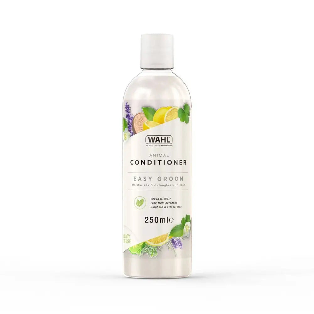 Transparent plastic bottle of wahl easy groom conditioner with easy groom label and lemon mint plant design showing specifically formulated ingredients