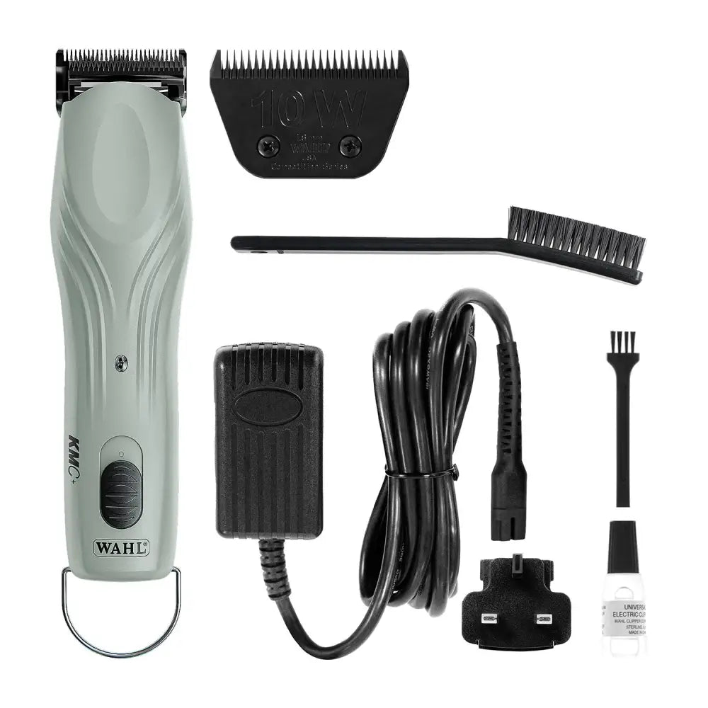 Light gray wahl kmc+ equine corded clipper kit with black comb attachment and accessories for easy grooming