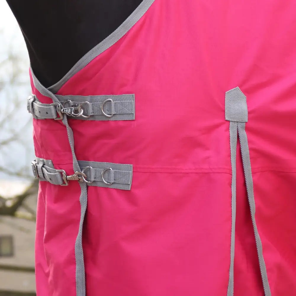 Bright pink whitaker 0g standard turnout rug pink with gray straps metal buckles and umbrella tail cover
