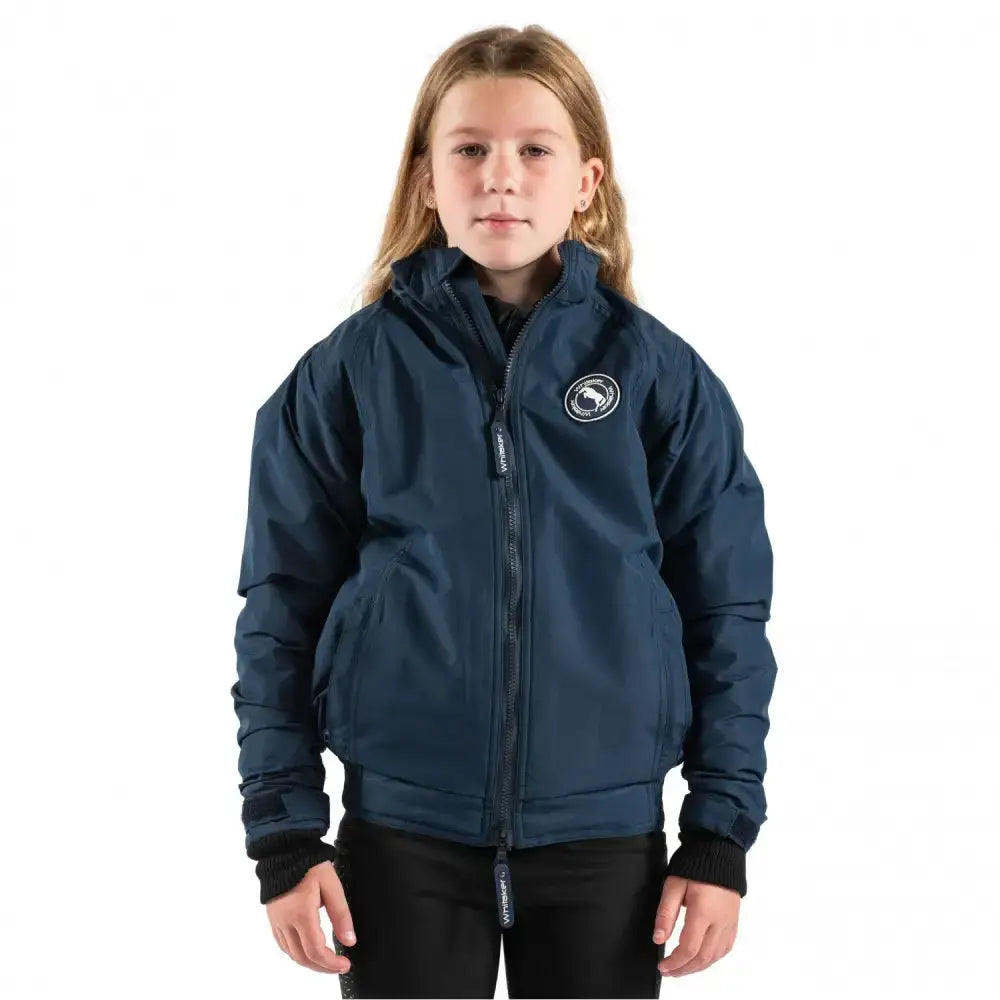 Navy blue waterproof whitaker ow165k holwick young rider team jacket with white logo and black ribbed cuffs
