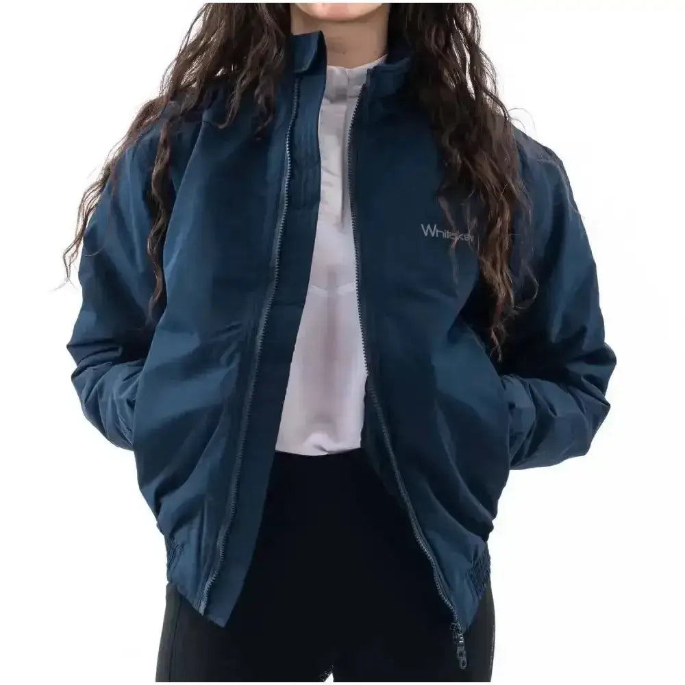 Dark blue nylon whitaker rastrick reflective unisex smug jacket with subtle white embroidered logo and showerproof upper