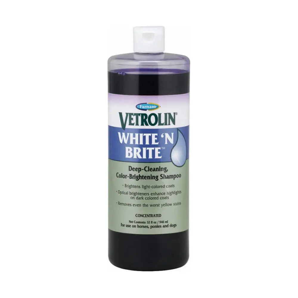 A clear plastic bottle with white cap contains dark purple white n brite brite shampoo with optical brighteners for horses and dogs