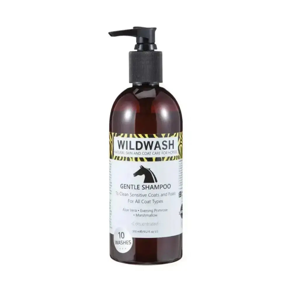 Dark amber glass bottle of wildwash horse shampoo gentle with black pump and zebra-striped label featuring marshmallow root