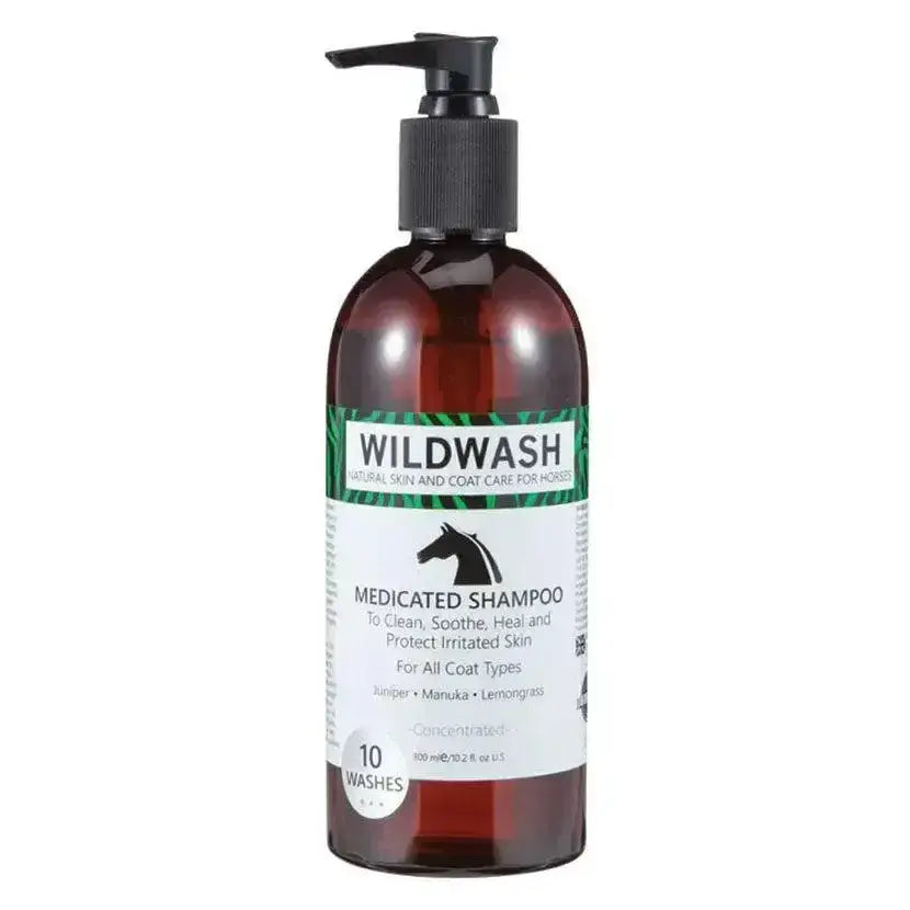 Dark amber glass bottle with black pump of wildwash horse shampoo medicated for horse skin and coat care