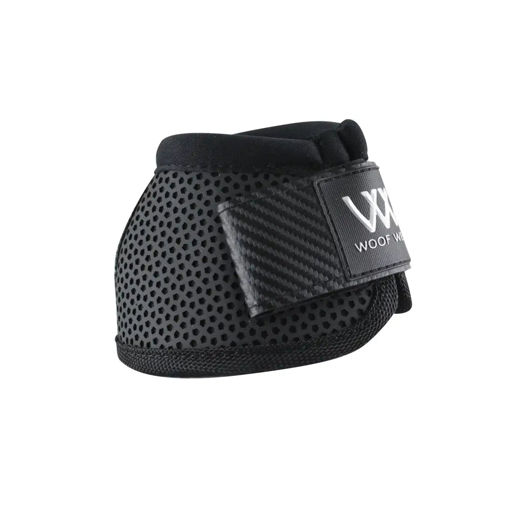 Black perforated overreach boot with carbon fiber strap and woof wheels branding by Woof Wear iVent turn overreach boot