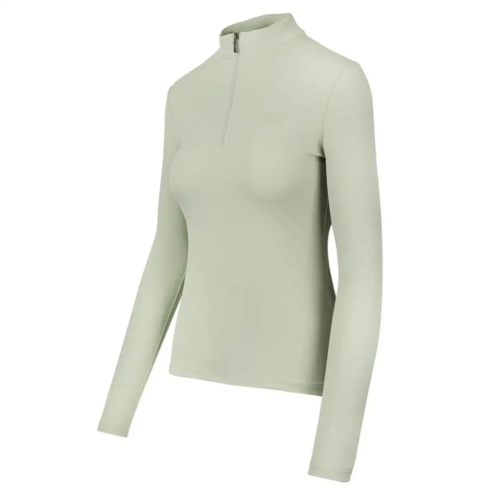 Woof wear long sleeve tech riding shirt in light sage green with half zip and subtle chest logo made with iflex pro fabric