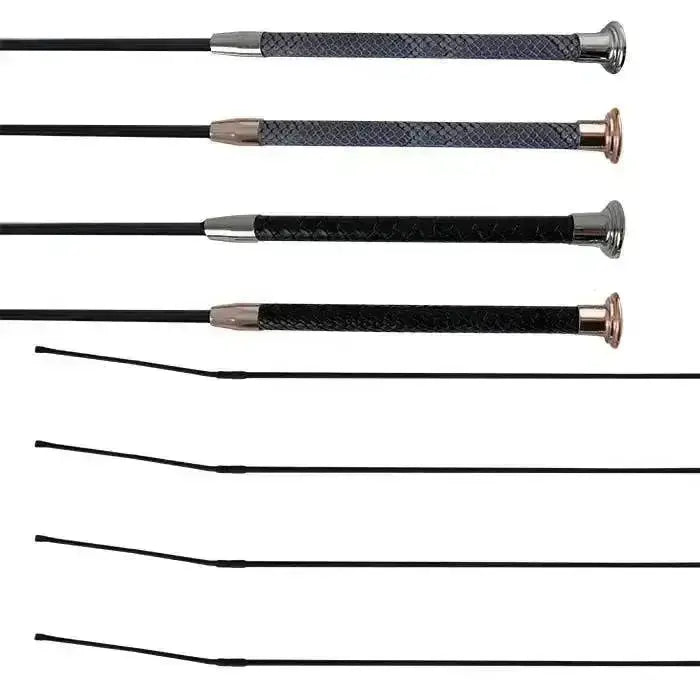 Set of four black woof wear reptile dressage whips with patterned faux snake skin leather grips and metallic ferrules