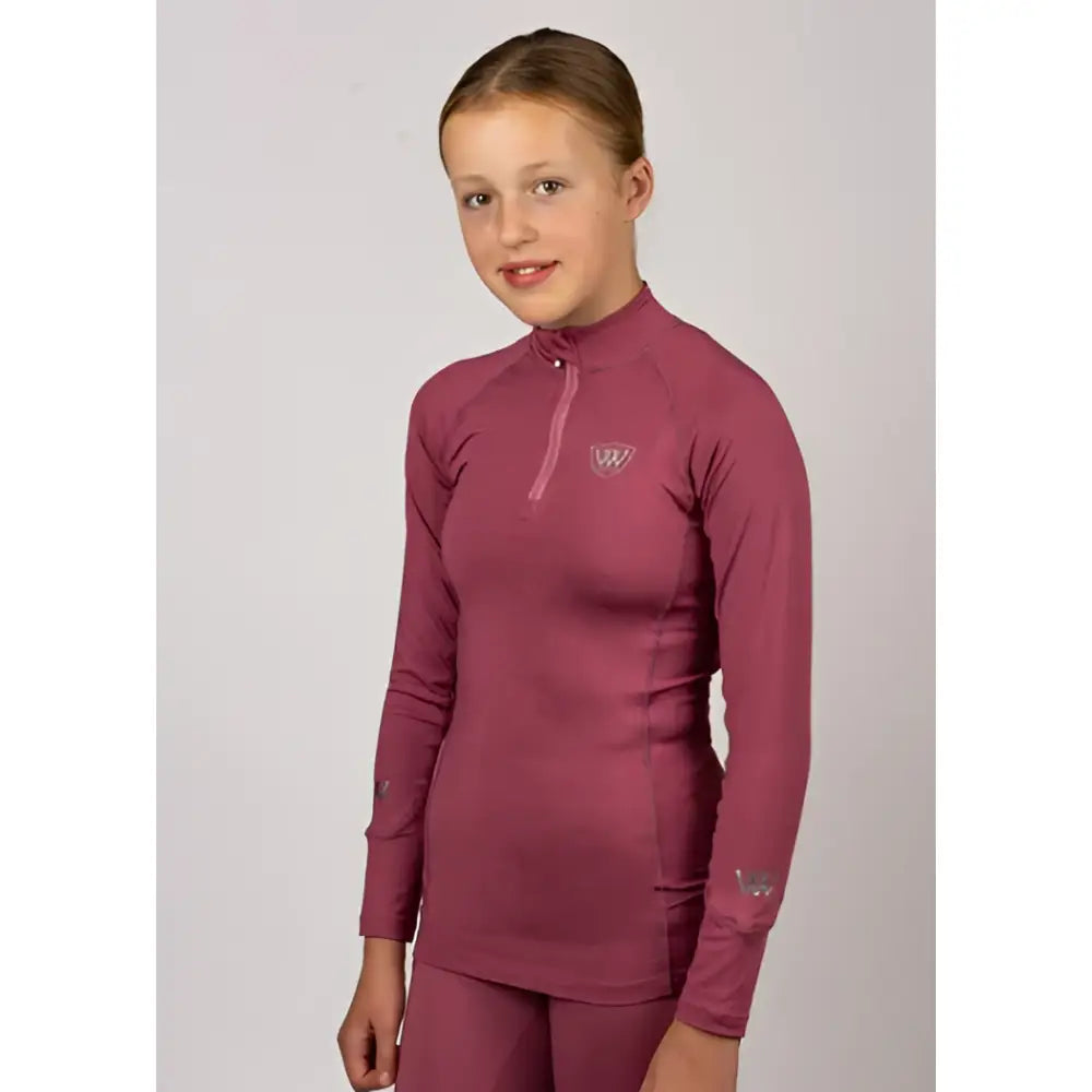 Maroon woof wear young rider tech shirt with quarter zip collar and subtle logo made from breathable iflex fabric