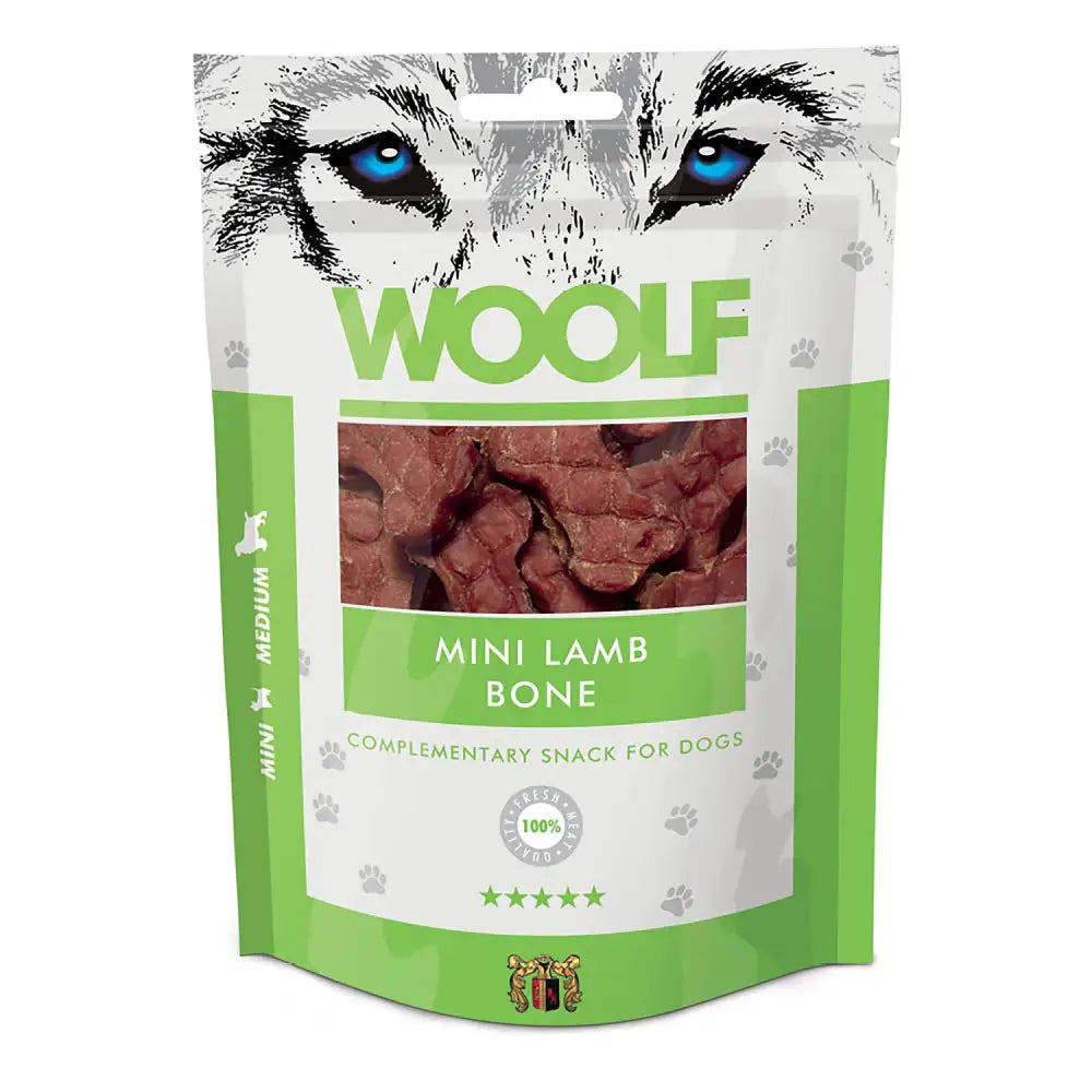 Green and white pouch of woolf mini lamb bone dog treats with a graphic of blue eyed wolf eyes on the front