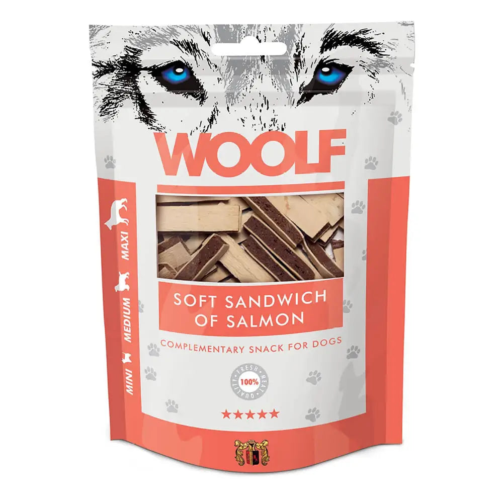 A bag of woolf soft sandwich salmon dog treats with blue eyes wolf graphic and brown rectangular snacks