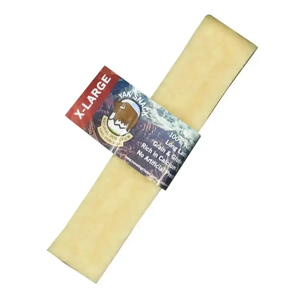 A pale yellow rectangular yak snack chew stick labeled x-large with a dog illustration, great for horses and equestrian use