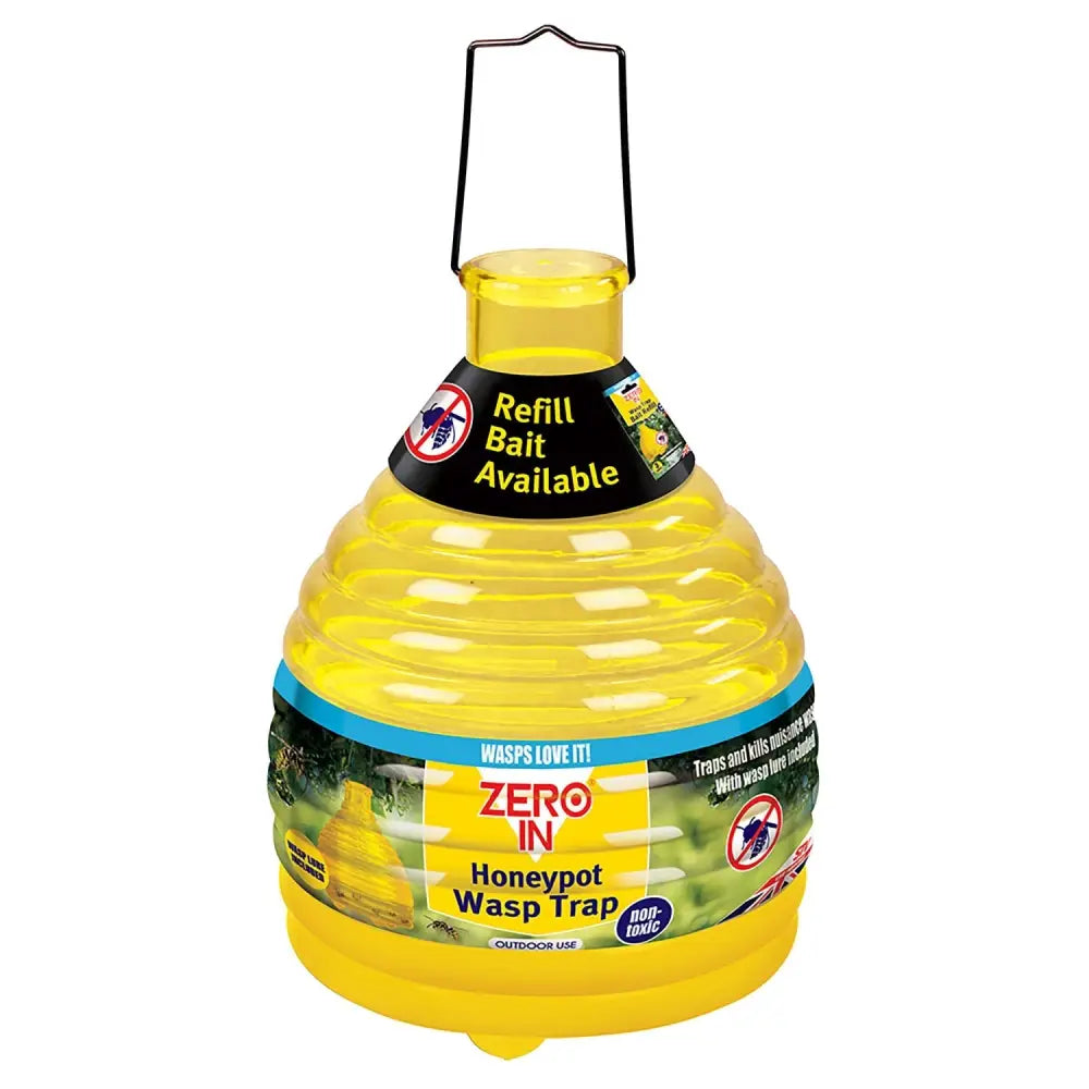 Yellow plastic honeypot wasp trap with black metal handle and non toxic label designed to allow easy baiting and bait redesign