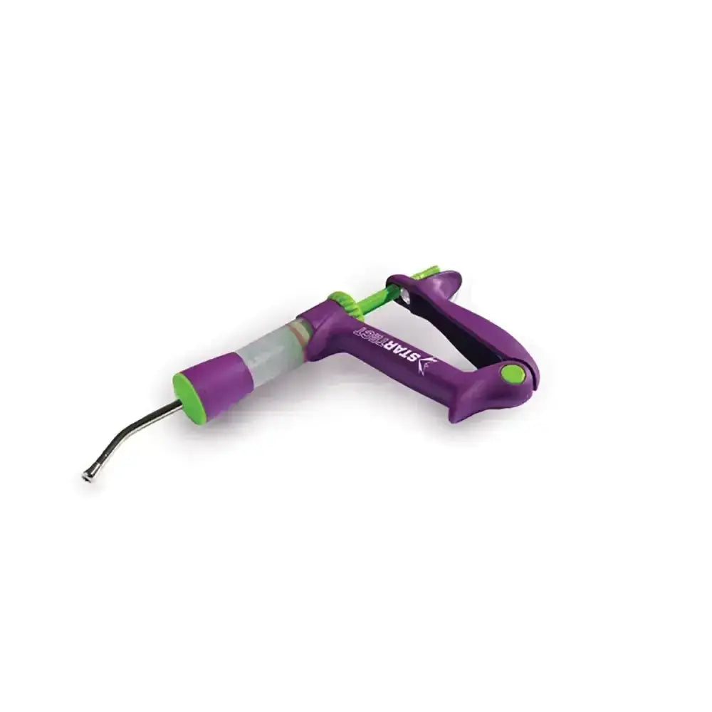 Purple and green plastic-handled zoetis startect drench applicator 15ml with clear barrel branded star river
