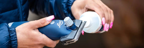 Electric hair clipper being used with clipper blades from Barnstaple Equestrian Supplies.