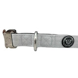 Silver woven nylon btactical dog collar in misty grey with sturdy metal buckle and black logo patch on side